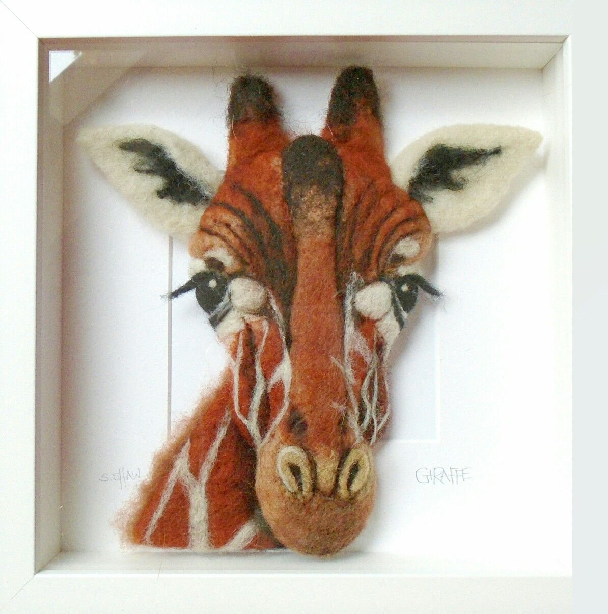 Валяние головы животных