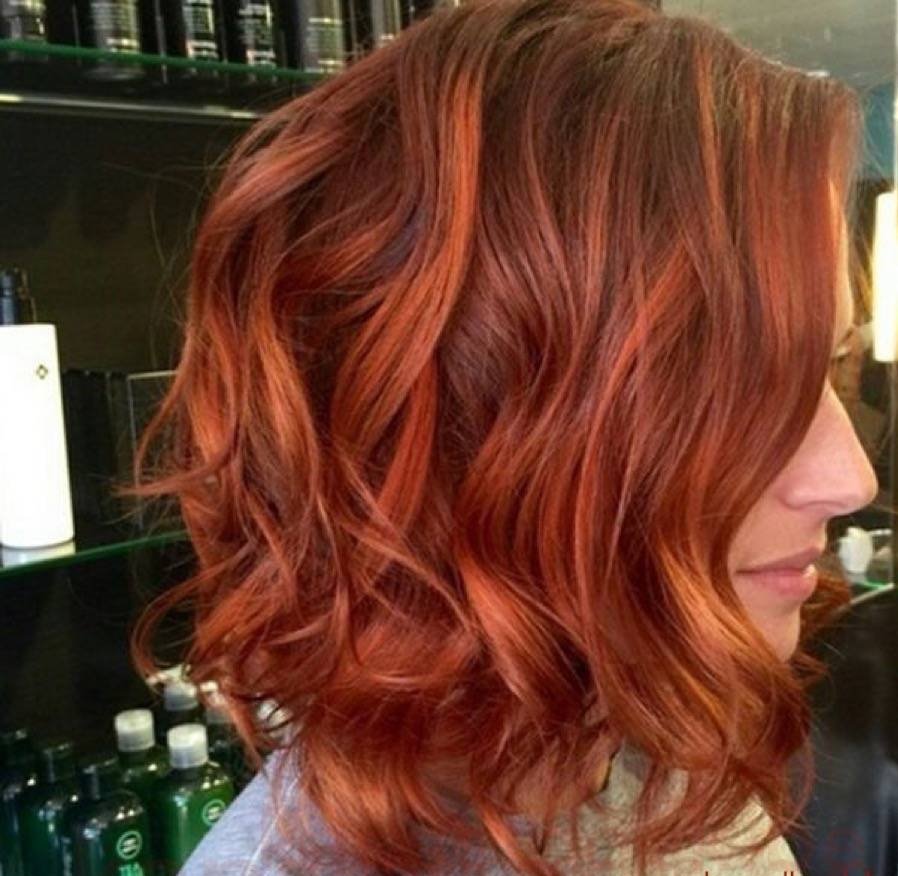 Ярко рыжий цвет волос с мелированием