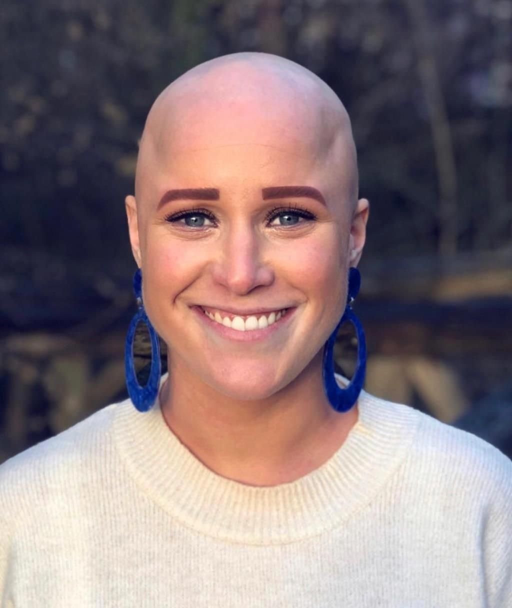 Архитектор с выбритым лбом