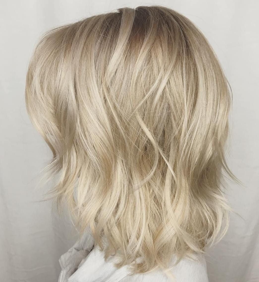 Каскад блонд до плеч