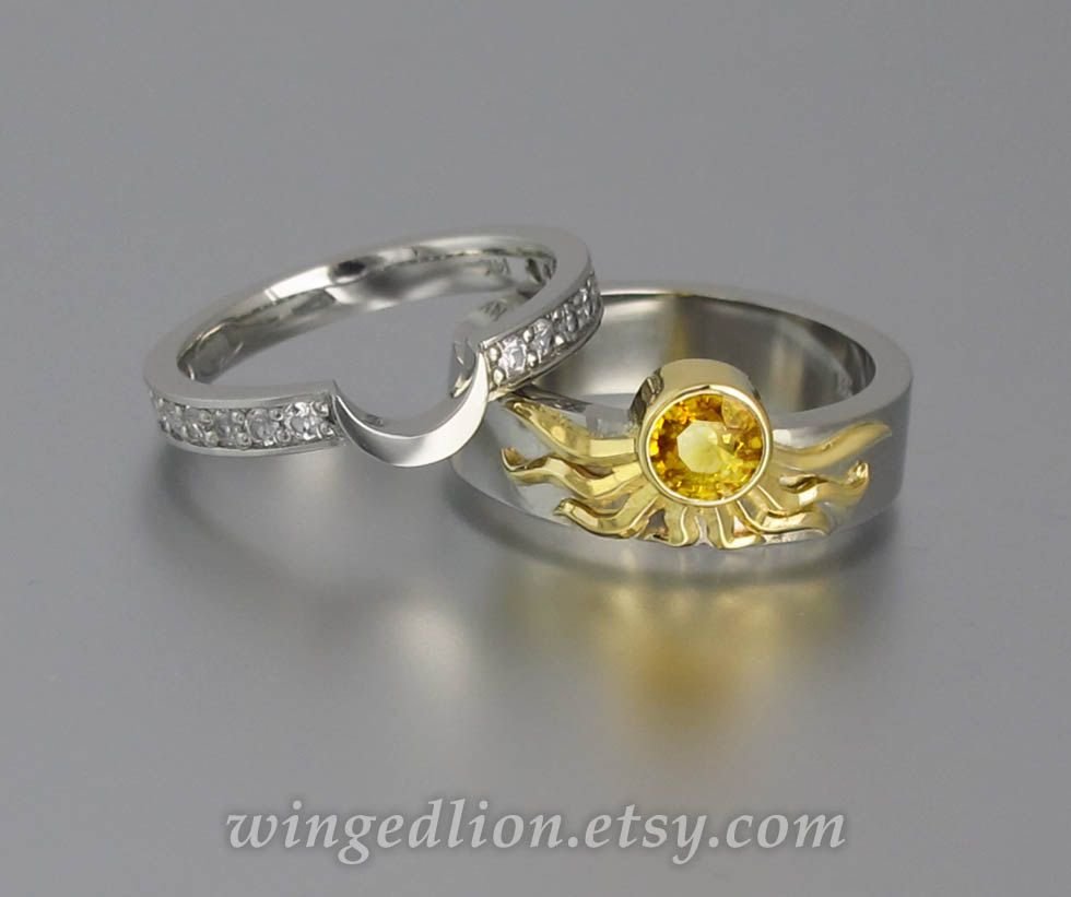 Парные кольца солнце и Луна