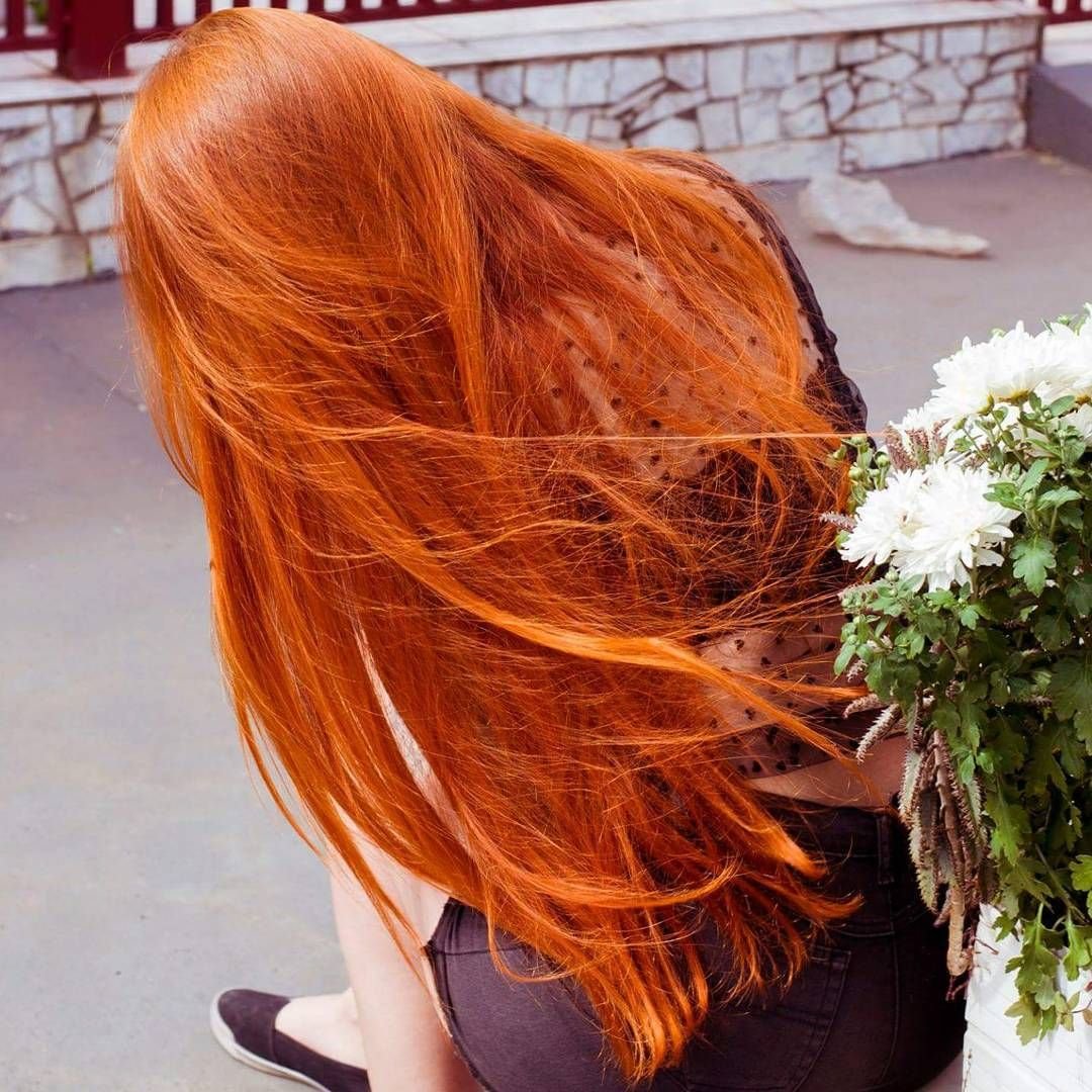 Красивые длинные рыжие волосы