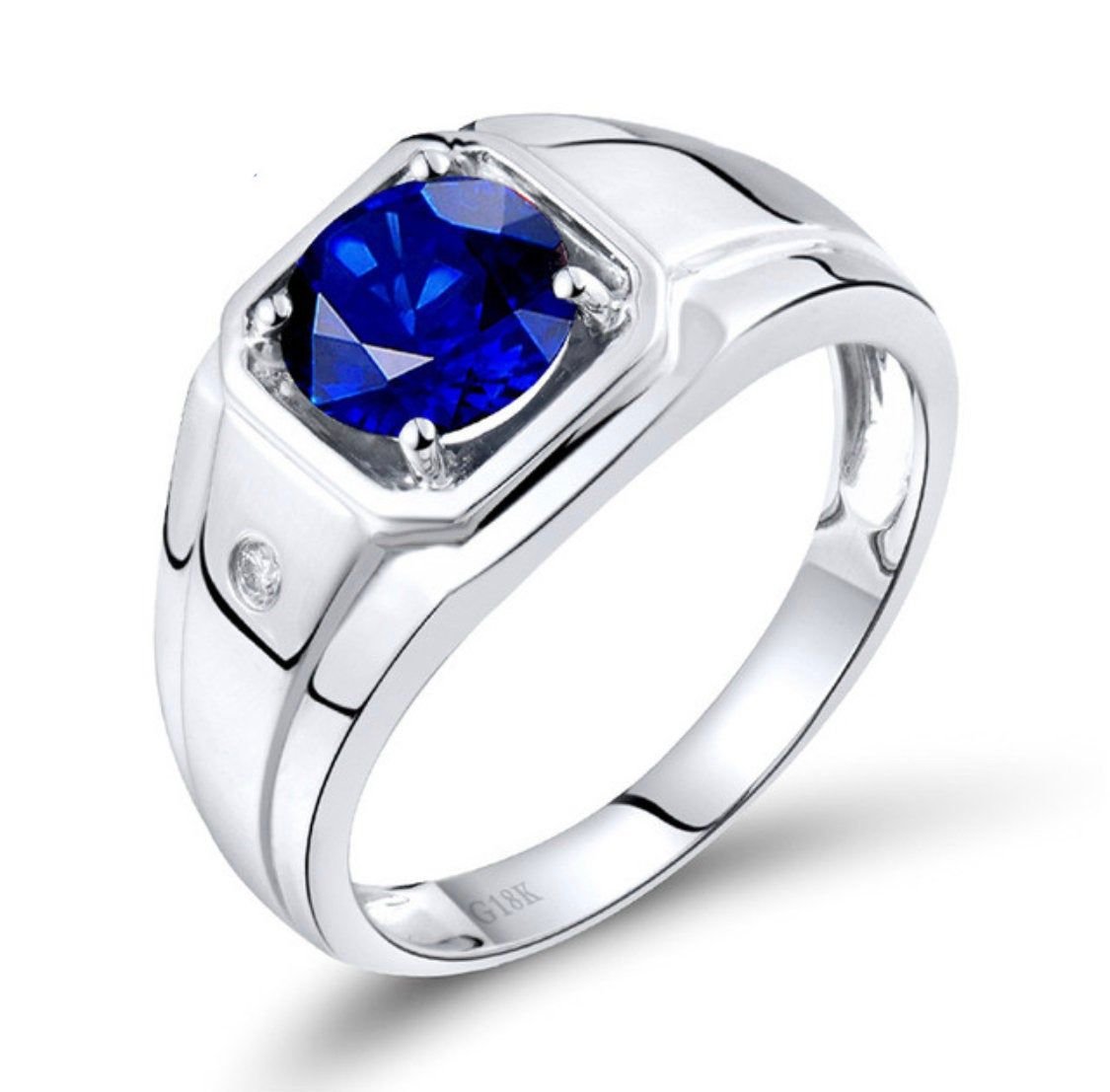 Обручальные кольца из белого золота с сапфиром