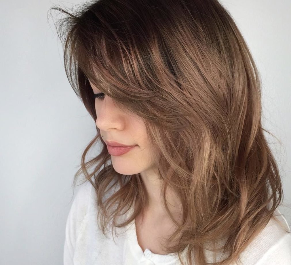 Градуированный каскад на длинные волосы с челкой