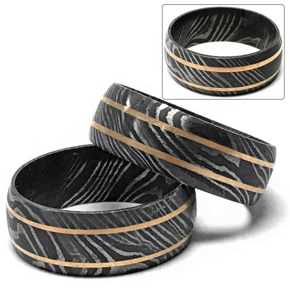 Обручальные кольца из дамасской стали