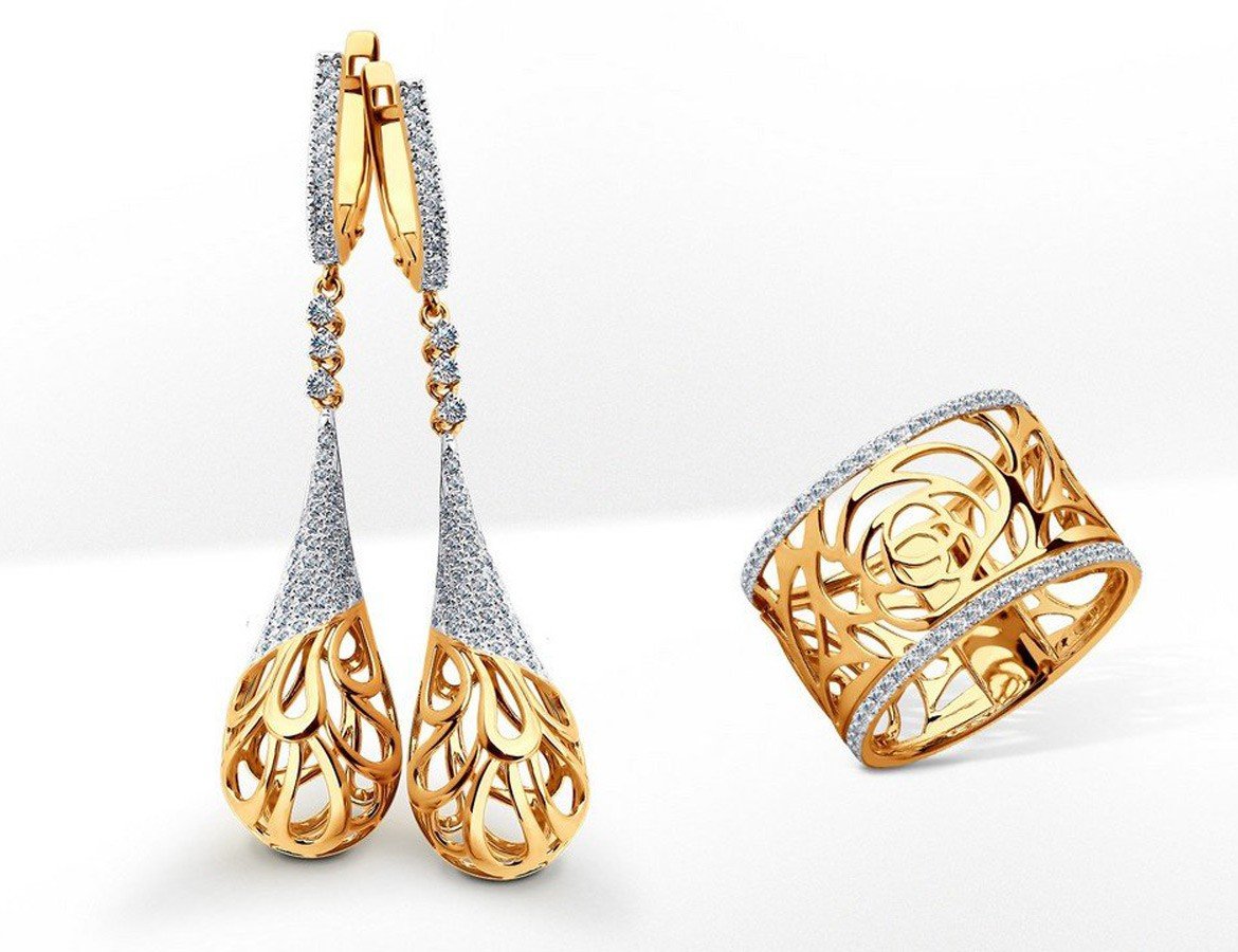 Золотые украшения на белом фоне