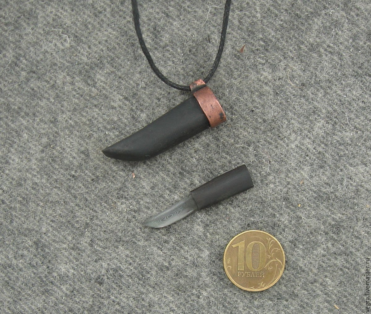 Серебряная подвеска кинжал