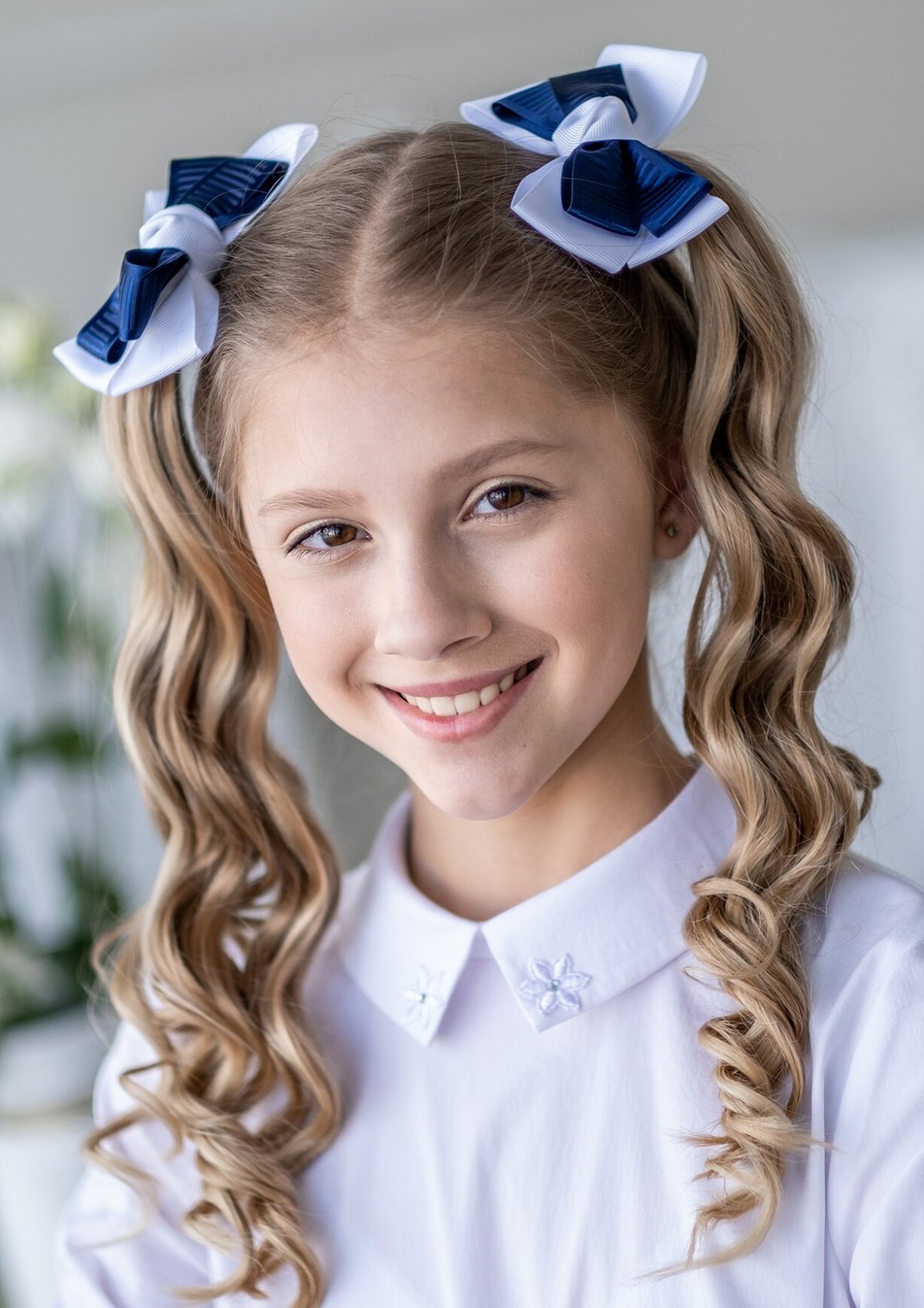 Прическа с бантиками для девочки