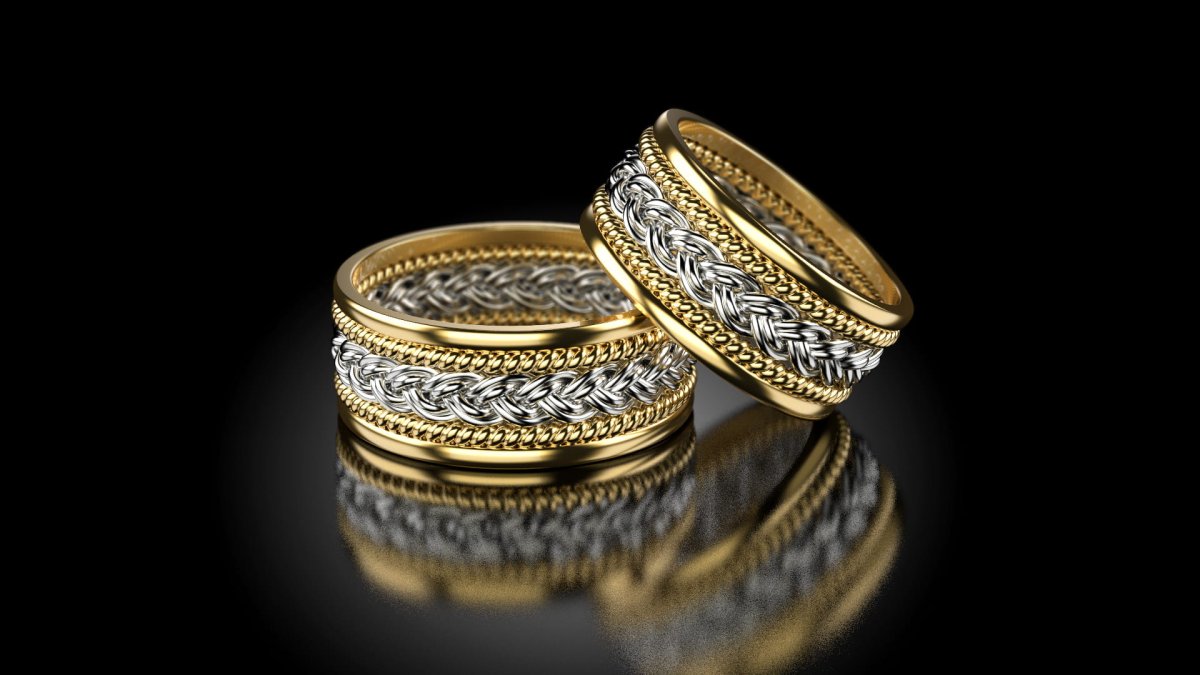 Обручальные кольца на белой ленте