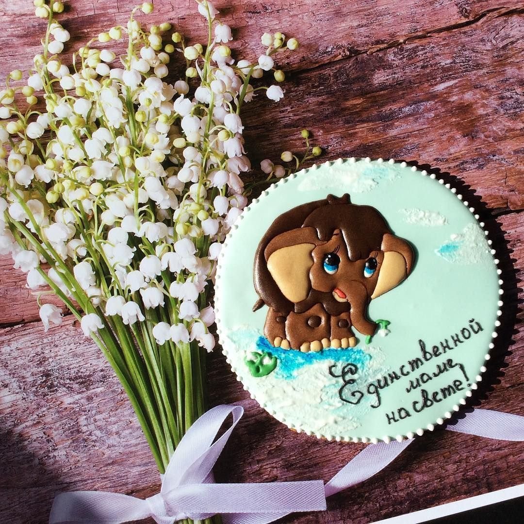 Мамонтенок с розой