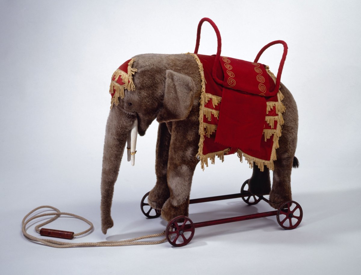 Игрушки на колесиках старинные