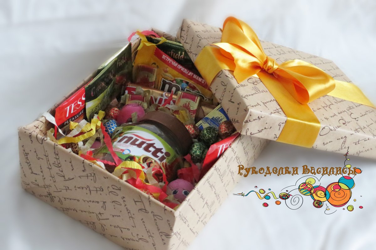 Наполнение коробки сладостями